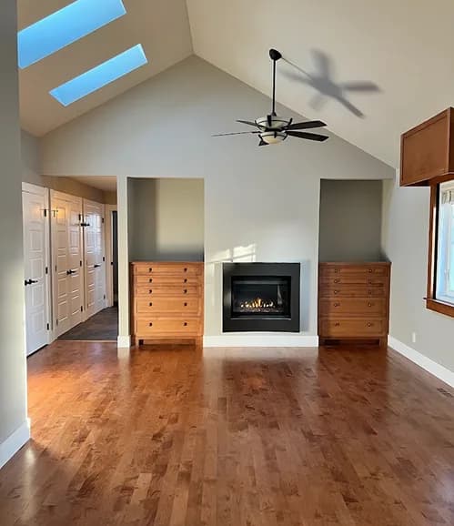 Modern living room with wooden floors and fireplace